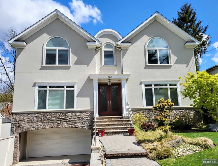 Elegant 6 Bedroom, 5.5 full bath Center Hall Colonial with 9 ft ceilings on first floor. Gracious Living Room, Formal Dining Room, Chef's kitchen with great Island and double appliances, Family Room, beautifully appointed guest powder room, Guest Suite with walk in closet and full bath, laundry facilities. Second floor grand master suite with custom paneled walk-in closet plus full bath, 4 additional large bedrooms and 2 full baths. Fully finished basement with excellent play area, large guest suite with full bathroom, 2 car garage plus separate entrance. 13 years young and custom built, multi zone heat and a/c, walk to all.