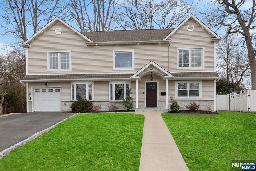 This 2020 total remodel offers a clean, modern lifestyle in one of Bergen Countyâ€™s safest towns. The first floor features a bright living area and a sleek kitchen with stone counters, alongside a versatile flex room that serves perfectly as a fourth bedroom or home office. Central air and forced hot air ensure year-round comfort throughout every level. The second floor is anchored by a unique loft with a glass railing, ideal for a secondary lounge. The primary suite is a true retreat, featuring both a massive walk-in closet and a second double closet. Its private ensuite bathroom is a major highlight, finished with a large double vanity and modern fixtures. Two additional spacious bedrooms and a third full bath complete this level, while the full finished basement provides incredible bonus space for a gym or media room. The backyard is a true private oasis and a standout feature of the property. With a large pool, expansive deck, and plenty of level green space, it is a perfect setting for summer entertaining and relaxation. This home is a commuterâ€™s dream, located near NYC express buses and a short drive to the train. Situated in a top-rated school district just blocks from Washington Elementary, this move-in-ready property is an exceptional find.