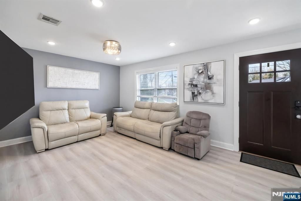 Photo of 65 Clinton Park Drive, Bergenfield, NJ 07621 (MLS # 26013831)