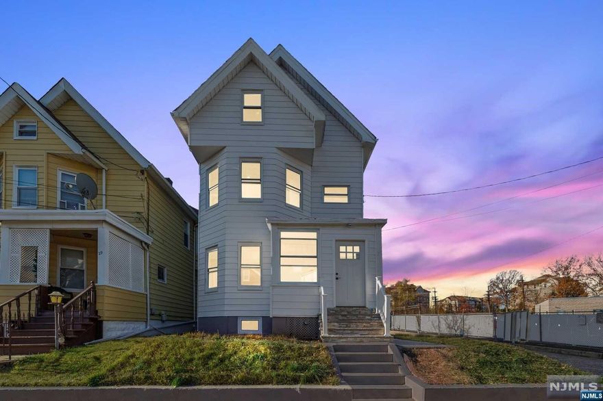 Welcome to this large and renovated colonial home ready for you to unpack and move in! This property has an open concept space featuring 4 bedrooms, 1 Full bath, 2 half baths, eat-in kitchen with quartz counter tops and stainless-steel appliances, formal dining room and living room with a fireplace. The basement is huge and nearly 50% finished with a half bath and walkout door, perfect for guests or just an entertainment area. All bedrooms are spacious and it is ready to be called yours!