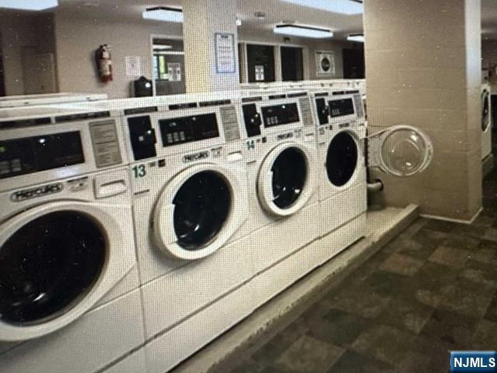 Photo of 2077 Center Avenue #3F, Fort Lee, NJ 07024 (MLS # 25014989)