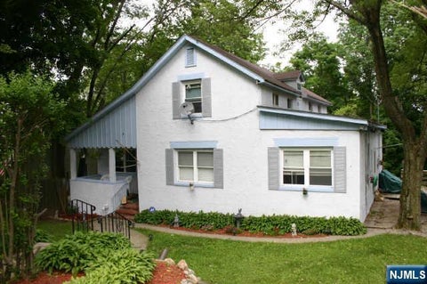 Photo of 9 Cedarbrook Road, West Milford, NJ 07480 (MLS # 26034444)