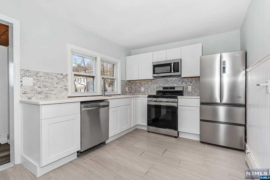 Welcome home! With this freshly updated two bedroom ranch you don't need to do anything except unpack your bags! This sunny home boasts freshly refinished hardwood floors, a brand new kitchen with new stainless appliances, and an updated bathroom with modern finishes. Outside, the home features a new roof with new gutters and a freshly regraveled driveway. This is truly a hidden gem in beautiful Hamburg - don't let it get away!