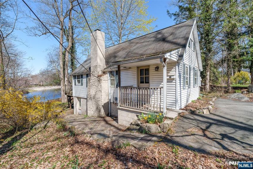 OPPORTUNITY KNOCKS! LAKEFRONT IN FAYSON LAKES!! Enjoy Stunning Sunsets from Your Own Backyard. When You Enter the Living Room you will find a Beautiful Wood Burning Stone Fireplace, a Vaulted Ceiling and Wood Floors. The Kitchen offers a Gas Range, Dishwasher, Refrigerator and a Pass-Through Window into the Dining Room for Entertaining. The Dining Room offers Lake Views and Sliding Glass Doors out to the Deck. There is a Main Level Primary Bedroom and a Full Bathroom with a Tub/Shower. The Second level offers Two bedrooms, "One with a Lake View" and Several Closets. Full Walk Out Lower Level with a Laundry Area, Storage area and Utility Room. Enjoy Fishing, Boating, Sailing and Ice Skating from Your Own Backyard. The West Lake (Main Beach) Is for All Swimming, Swim Races and Fun Activities for Everyone. Enjoy Tennis and Hiking Trails. Kinnelon Offers Top Rated Schools Year after Year and is Close to Shopping, Transportation, Golf Courses, Ski Resorts, Major Highways and Only Approx. 35 Miles from New York City. (This House Is Being Sold In As-is Condition.)