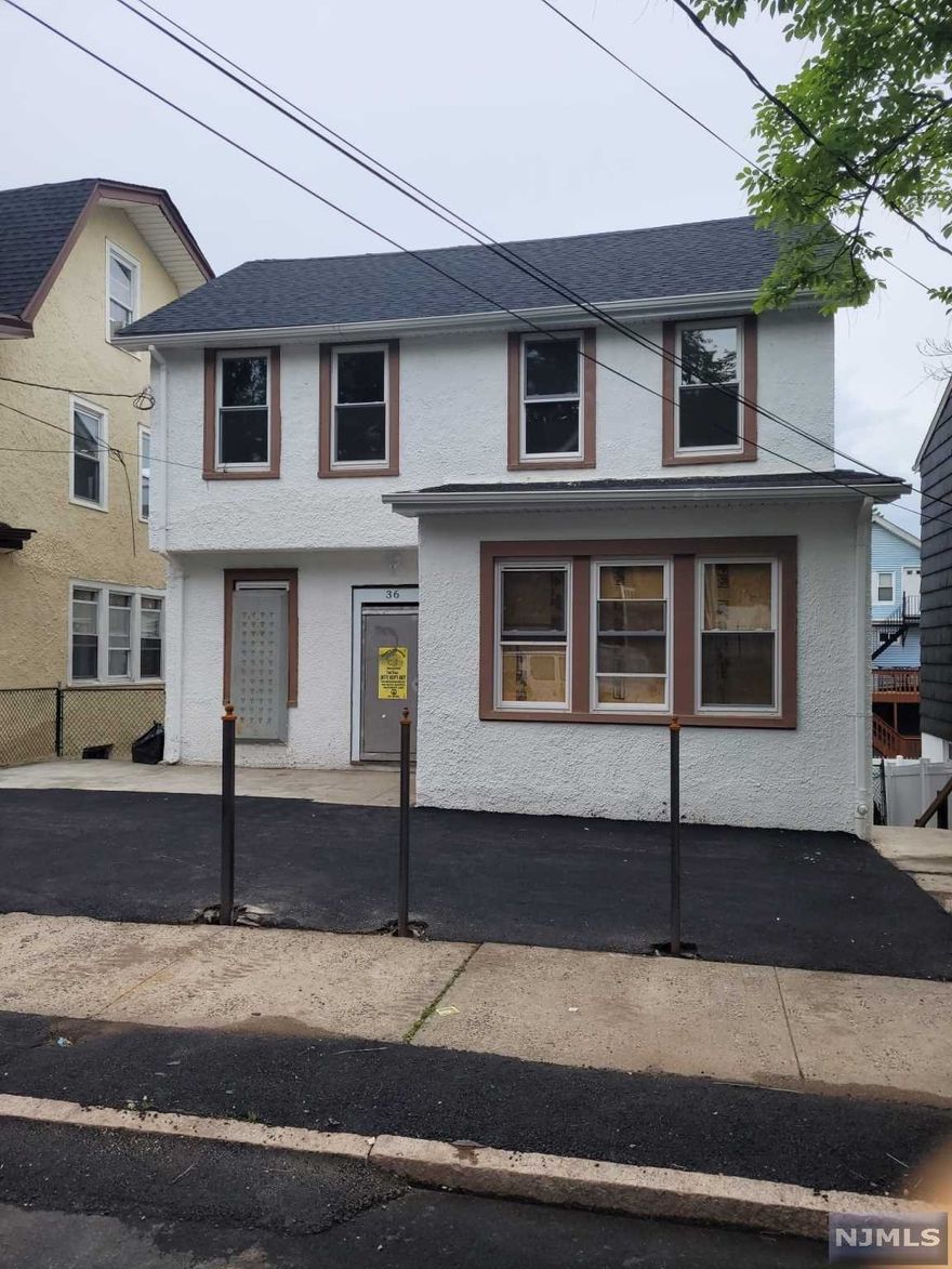 Newly Renovated Single Family with the following upgrades new kitchens/baths, plumbing/electrical, wood/tile flooring, windows/doors, roof, heating/cooling etc... This home features finished basement with summer kitchen, full bath, large finish area (family/bedroom) First floor living room dining room eat-in kitchen half bath Second floor 3 bedrooms and main bath.