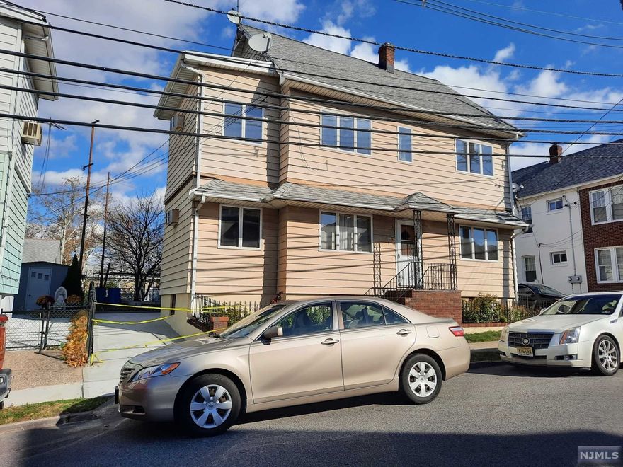 Great opportunity: 2 family in Wallington , not in the flood zone. 1st and 2nd floor units offer identical floor plans: living room with separate office/ playroom space, dinning room with enclosed porch, kitchen, full bathroom and 2 bedrooms. Attic offers 2 additional rooms. Walkout basement offers 2 rooms and laundry/utility room. Parking for 2 cars, patio, fenced in backyard. Low taxes: $6556. Great location: close to NYC bus and NJ bus, stores, schools.