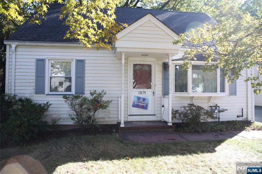 Welcome to this inviting and well-maintained three bedroom, one and a half bath home nestled in a desirable Hawthorne neighborhood. The first floor features a spacious living room filled with natural light, a dining room with vaulted ceilings that opens to a relaxing deck perfect for entertaining, and a charming kitchen with plenty of cabinet space. Two comfortable bedrooms and a full bathroom complete the main level. Upstairs, youâ€™ll find a private third bedroom and a versatile bonus room ideal for a home office, playroom, or guest space. The unfinished basement offers great potential and includes a convenient half bath, laundry area with washer and dryer, and all utilities. Outside, enjoy a one car detached garage and a peaceful setting close to parks, schools, shopping, and NYC transportation. This cozy home combines comfort, functionality, and location, ready for its next chapter.