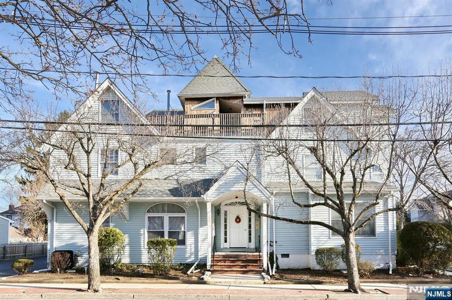 Updated condo in a peaceful neighborhood near the Oradell border. Step into a bright foyer featuring a powder room and a modernized kitchen. The spacious living room is filled with natural light, boasting a vaulted ceiling and hardwood floors. A stylish spiral staircase leads to the upper level, where you'll find a convenient laundry area and a generous ensuite bedroom with a relaxing tub. Enjoy a beautiful private balconyâ€”perfect for morning coffee or quiet evenings soaking in the fresh air.