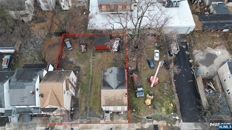 Unique investment opportunity! TWO 2-family homes on a rare 75â€™ x 100â€™ double lot in Paterson â€” thatâ€™s 4 total units plus a detached garage. Layout includes: (1) 2BR/1BA + 4BR/1BA and (2) 1BR/1BA + 3BR/1BA. One upper unit is updated with new floors, fresh paint, and a remodeled bath. Perfect for income-producing rental or owner-occupant with extra units. Separate entrances and two tax lots offer flexibility â€” possible development opportunity (buyer to confirm with town). Located near transportation, shops, and schools. Don't miss this rare multi-family setup with growth potential!