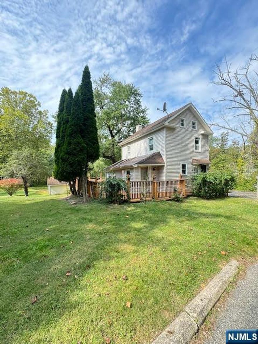 Investor opportunity! This 2-bedroom, 1-bath home is ready for your vision. Situated on just under 3 acres, the property includes a detached garage and a walk-out basement, offering great potential for future improvements or expansion. Property is being sold strictly "AS IS." Seller will not make any repairs or offer credits for inspection-related issues. Don't miss this chance to bring your ideas to life in a peaceful, spacious setting.