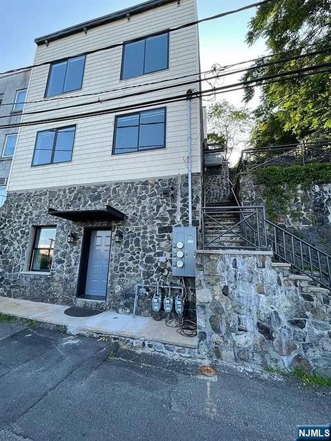 Photo of 9009 Riverside Pl #2, North Bergen, NJ 07047 (MLS # 25041579)
