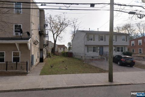 Photo of 128 N Main Street, Paterson, NJ 07522 (MLS # 26006127)
