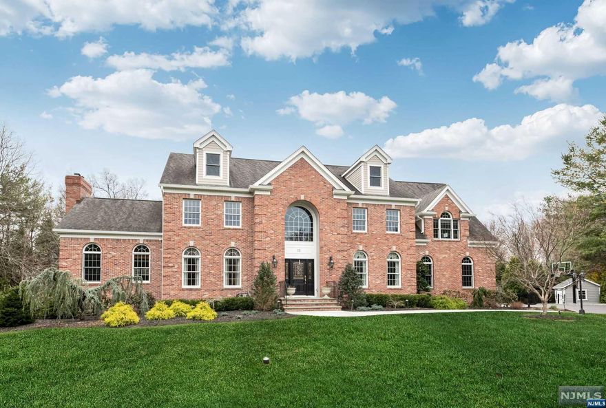 Classic design, balanced proportions, bucolic setting and unrivaled amenities add up to the complete lifestyle experience you've been holding out for. This exceptional Mahwah home sits majestically at the end of the cul-de-sac. As you enter this 5 Bedroom 4 bath Colonial, you are greeted by a stunning 2 story entrance foyer that escorts you into an open floor plan. This property offers an array of luxurious amenities that will take your breath away. Some features: custom kitchen, stone walk-ways, 3 gas fireplaces, surround sound A/V systems, Sonos System with Bose speakers throughout the home and outdoors, heated salt water pool with attached spa, walk out basement with built in bar, perfect for poolside entertainment. A fully renovated spa-like master bathroom with jacuzzi and dual shower is perfect for unwinding after a long day. Exceptional schools and an easy commute to NYC visit https://mahwahtwp.org/31/Community