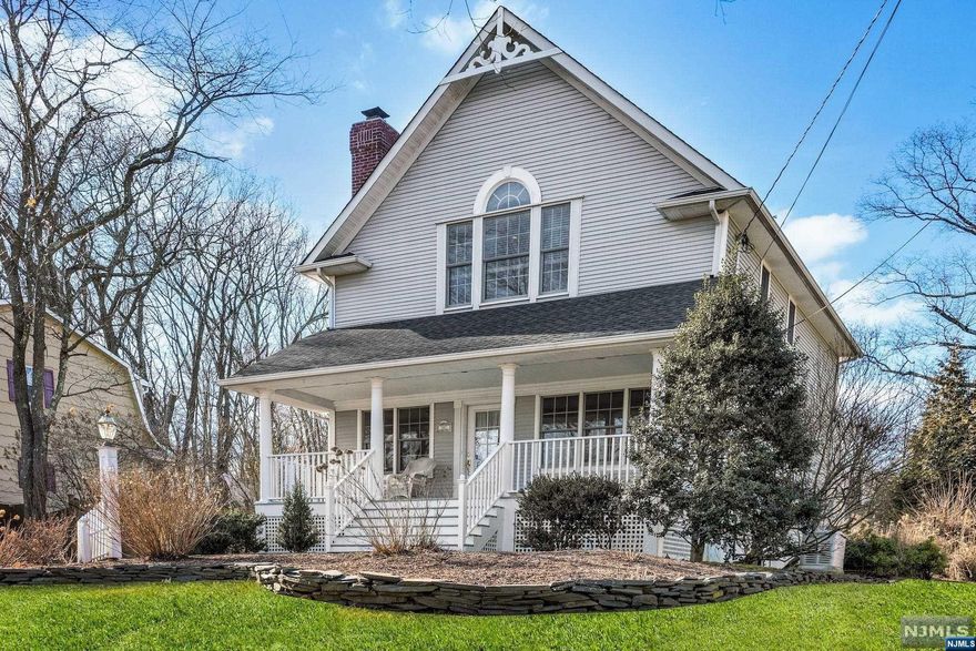 Beautiful 4-bedroom Colonial in Wyckoff. The utter charm of this home is captured in its curb appeal. Sitting atop a hill, with a vista of soft greens, you'll adore the tranquility of your perfect porch. Now, step into the warmth of the Living Room, w/ WBFP & gas igniter. The regal Dining Room is approached through pillars. The Eat-in Kitchen is large, modern, w/ SS appliances, granite counters & large island. The first Family Room is a place to unwind. The 2nd Floor has a large sitting area. Two sizeable Bedrooms. And your Primary Bedroom. The En Suite features tray ceiling, lovely Palladium window & Walk-in Closet. Full bath & Vanity. The floor has a 3rd Full Bath. The lower-level features a 2nd Family Room. This one quite large. A 4th bedroom, maybe a Guest Suite. Note: Property Card lists home as 3 Bedrooms. The backyard is flat, green, with paver patio. Detached 2-car garage. Home has Central Air, Whole House Generator. Come by, fall in love.