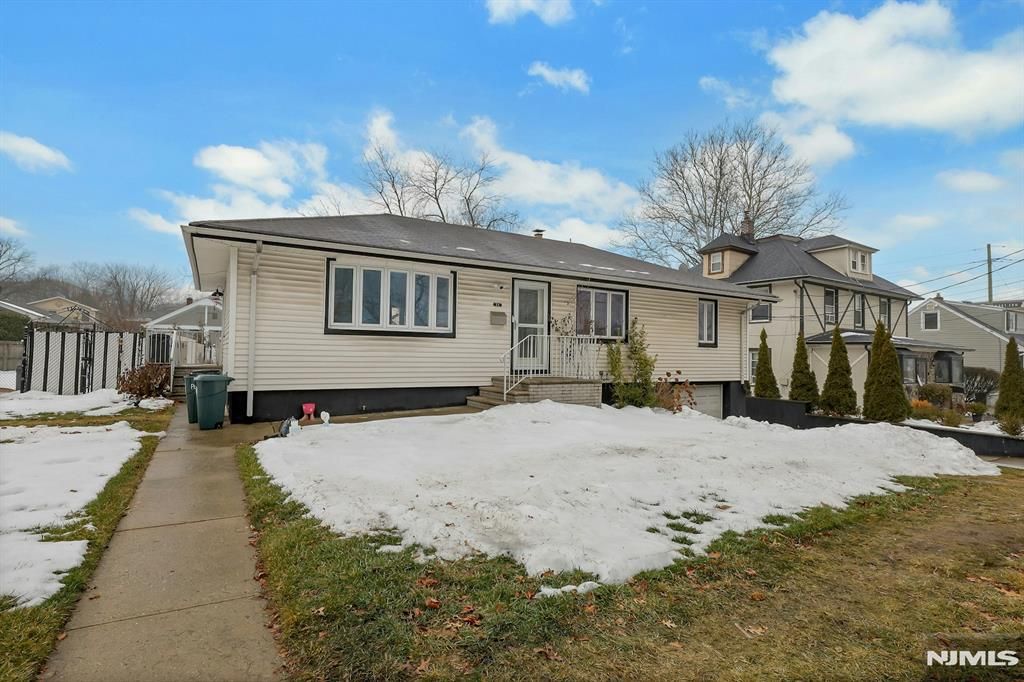 Photo of 14 Passaic Avenue, Hasbrouck Heights, NJ 07604 (MLS # 26004391)