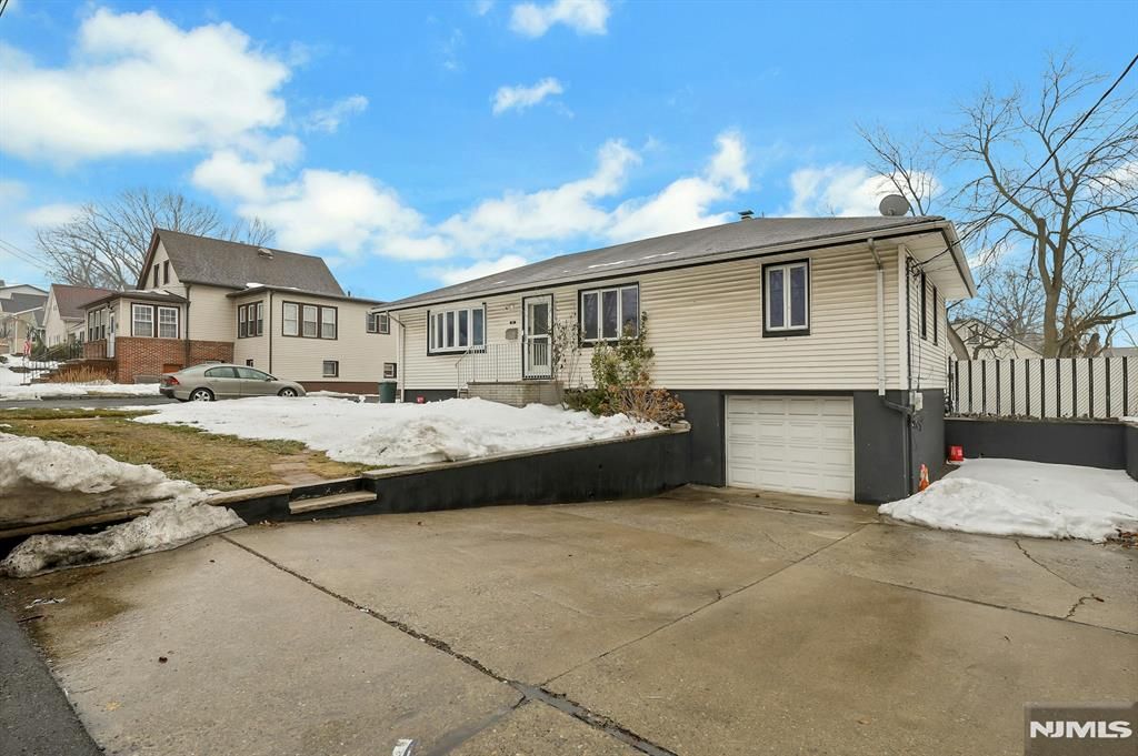 Photo of 14 Passaic Avenue, Hasbrouck Heights, NJ 07604 (MLS # 26004391)