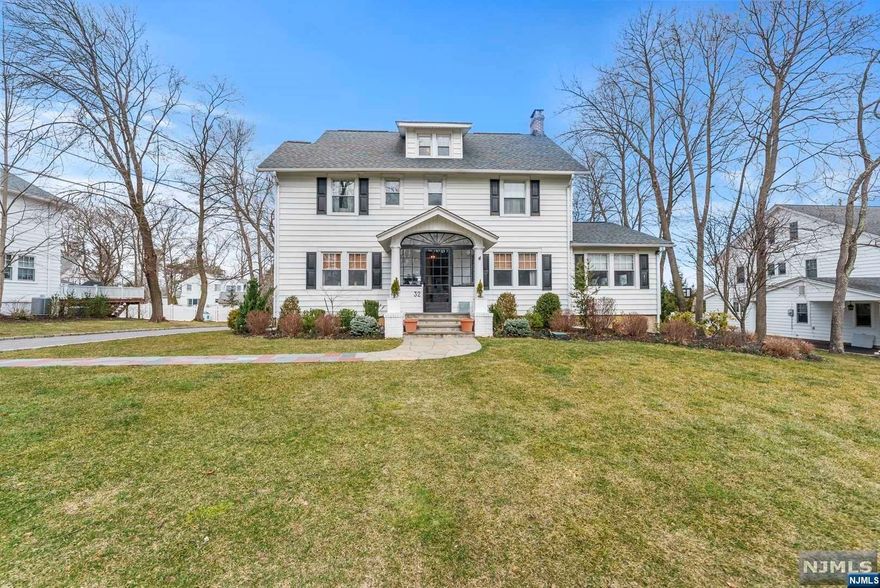 This sought-after Afterglow section stunner will impress right from the drive up. Located on a quiet cul-de-sac, this beautiful Center Hall Colonial is located in one of Verona's premier locations. Situated on a 1/3 acre of pristine landscaping, 32 Summit Road features 5 bedrooms and 6 bathrooms (3 full, 3 half). Enter through the bright, window covered vestibule with heated floors to the foyer of this flowing floor plan. First floor features include the chef's kitchen with Wolf and Viking appliances and eat-in area overlooking the grounds, formal dining room, powder room, family room w/ WB fireplace, plus bonus room with walk-out to the deck complete with outdoor entertainment area. The second floor features 2 bedrooms (one with half bath) and upgraded hallway bathroom, plus the master bedroom with a beautifully updated bathroom complete with steam shower, soaking tub, heated floors and luxury toilet. Retreat upstairs to the 3rd level with 2 additional bedrooms and hallway bath.