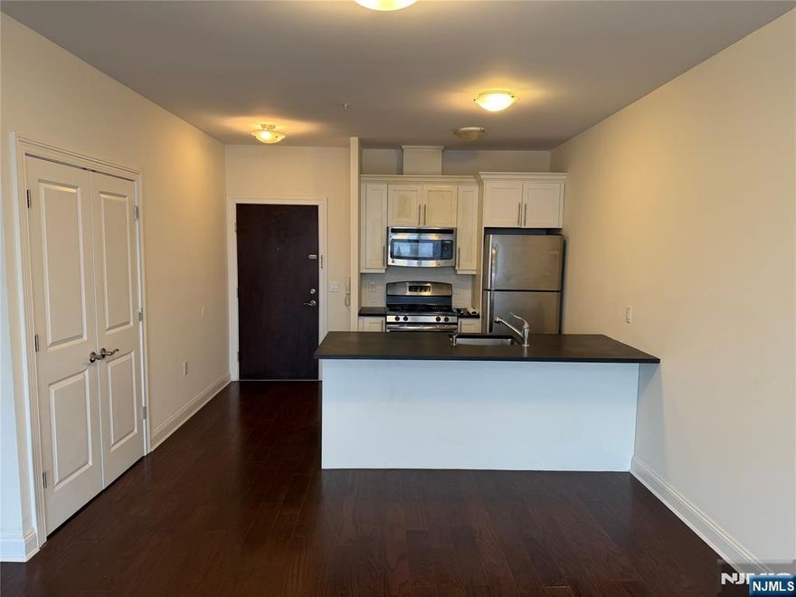 **FIRST MONTH FREE on a 13-month lease + one parking space included! - for occupancy commencing on or before 2/1/26!** Hello, 225 Walker St! At this desirable location in Cliffside Park, you are minutes away from public transportation options [to NYC] as well as routes that lead to main roads and highways to navigate throughout what New Jersey has to offer! Spacious 1-bedroom + 1-bathroom apartment with ample living and closet space! Inside this worthwhile apartment, you will find hardwood floors throughout, high ceilings, GE appliances throughout, Kitchen-Aid refrigerator, intercom system, in-unit washer/dryer, as well as attached parking! **PARKING: 1st space INCLUDED IN THE RENT(!); Additional space - $125/monthly!** 225 Walker St is pet friendly (lb limit + fees apply)! REDUCED rent security deposit offered to qualified applicants! Tenant is responsible for ALL utilities! Move-in fee applies! Virtual tour available upon request!!