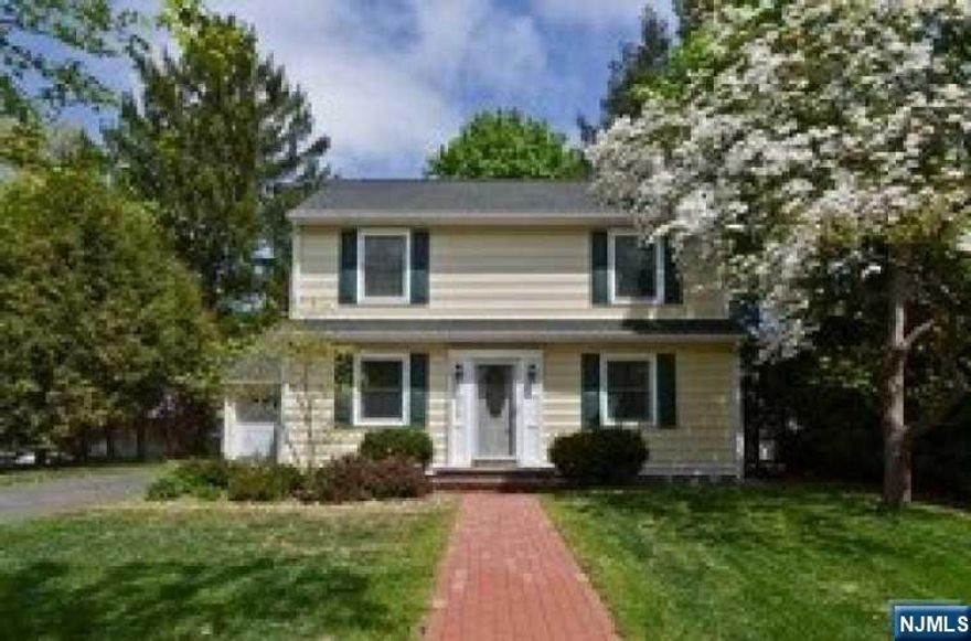 Final and best Apr 19th 6pm. This young Center Hall Colonial in a quiet street was totally rebuilt in 2008 and well maintained. It is facing south, full of sun. It featured 4 Bedroom, 2.5 Bath and fully finished spacious basement. It is located in highly desirable Ridgewood school district, steps away to Saddle River Bike Path and close to all. This gem's first floor features nice living room, dining room, 1 bedroom, half bath and gorgeous kitchen with brand new granite counter tap, brand new stainless appliances. Glass doors in the kitchen leads to fenced backyard with stone flower bed and newly built deck (2 years old). Second floor offers 3 bedroom and 2 full bath. Spacious master bedroom with walk in closet. Basement is fully finished with newer boiler and carpet (3 years old). Gas heating with hot water baseboard, Central air, 3 zone.