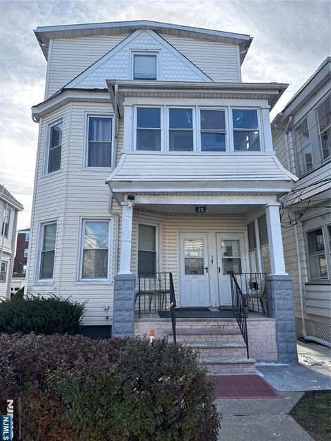 Photo of 25 Burgess Place, Passaic, NJ 07055 (MLS # 25043287)