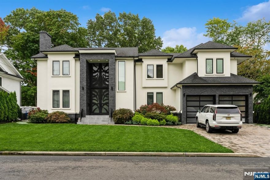 Welcome to 44 Floral Terrace, a luxurious home in one of Tenaflyâ€™s most desirable neighborhoods. Built in 2016, this sun-filled residence offers over 6,000 sq ft of elegant living space with high ceilings and custom finishes throughout. The main level features an open-concept layout and a gourmet kitchen with top-of-the-line appliances. A spacious family room with built-in surround sound is perfect for entertaining. Upstairs, the primary suite offers a spa-like bath and generous closet space. The fully finished basement includes a full gym, plus a private bedroom with a full bathâ€”ideal for a home office or guest suite. Outside, enjoy a beautifully landscaped yard with a Jacuzzi, full outdoor kitchen, and ample space to relax or host. The home is equipped with a surround sound system inside and out. Located on a quiet street close to top-rated schools, parks, and downtown Tenafly. A rare blend of comfort, luxury and convenience.