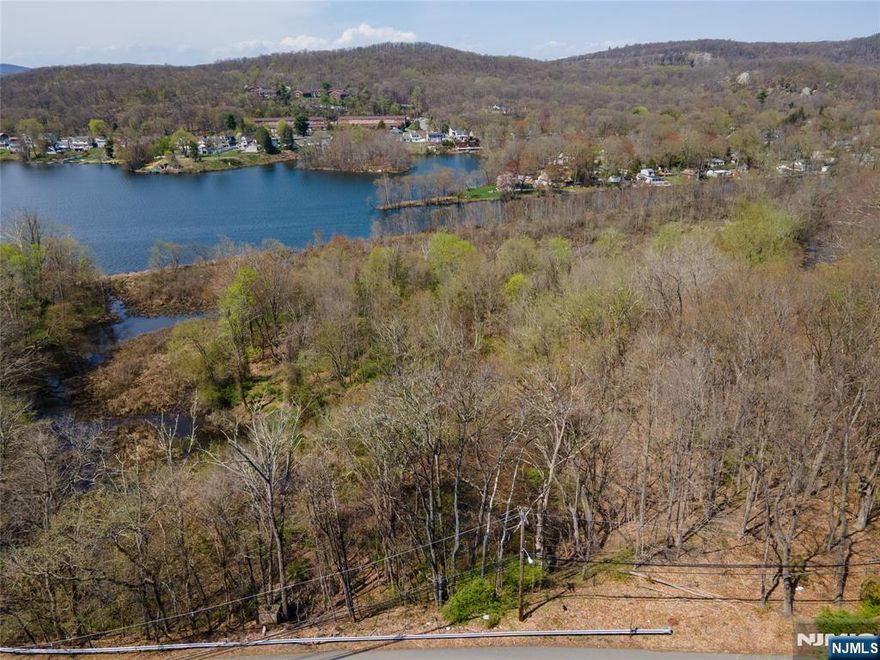 Large Lot 4.20 Acres. Wayne Water Front Property Overlooking Pompton Lakes Located Close To The Oakland/Wayne Border. Zoned R-A. Lot is approved tobuild a single family home.