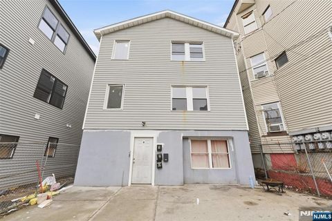 Photo of 9 Godwin Avenue, Paterson, NJ 07501 (MLS # 26007512)