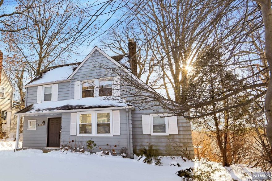 Lovely picture perfect home in prime Englewood location! Gorgeous deep (50 x 144) property! Numerous upgrades throughout. First floor boasts gracious Entry Hall; Living Room with wood burning Fireplace & built-in bookcases; Dining Room; Family Room; Office/Bedroom; Powder Room; Updated Kitchen with SS appliances & door to beautiful deck. Hardwood floors throughout. Second floor features three bedrooms & a full bathroom. Fully finished basement is complete with play room, full bathroom & laundry. Wood deck extends length of house; completely gated. 2 Zone Heating (forced air) & Air-Conditioning. Great central location--minutes to houses of worship, schools, parks, shopping, buses, GWB & NYC. Make this wonderful home yours!