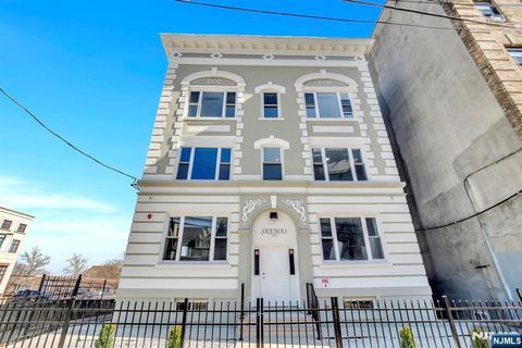 Photo of 157 Clifton Ave, Newark, NJ 07104 (MLS # 25043279)