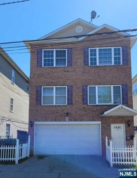Photo of 30 N 5th Street, Paterson, NJ 07522 (MLS # 25041576)