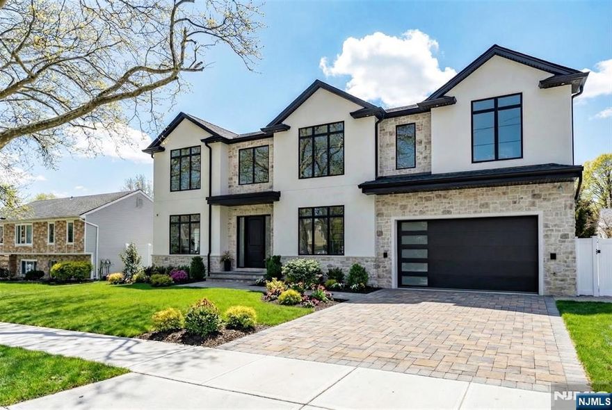 Brand new construction, new foundation masterpiece in the heart of Paramus. EST. COMPLETION MARCH 2026! This exceptional residence, built by Avant, showcases impeccable craftsmanship, designer finishes, and thoughtfully curated living spaces throughout. Featuring 6 bedrooms and 6.5 bathrooms, the home offers an ideal blend of luxury, scale, and everyday functionality. Grand entrance foyer introduces the homeâ€™s impressive interior. Fantastic chef's kitchen features custom modern cabinetry, a waterfall island, and a premium Sub-Zero and Wolf appliance package. that is open-concept to the great room with gas fireplace.. 1st floor bedroom suite. The stunning primary suite is a true retreat, offering a massive layout with two oversized custom walk-in closets, and a spa-inspired primary bath complete with a soaking tub, expansive glass shower and luxurious designer finishes throughout. Additional highlights include glass stair railings, custom millwork and accent walls, and a fully finished walk-out lower level with a huge theater, bedroom, recreation space, and wet bar. Equipped with multi-zone HVAC, integrated speakers, designer lighting, and extensive custom closets, this newly constructed luxury home offers elevated modern living in one of the most desirable locations in Paramus.