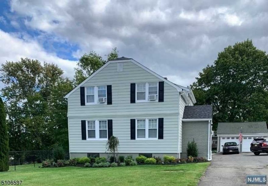 Unique, updated custom home set back on almost an acre of beautifully landscaped, desirable Wayne property, built-in pool with fence, oversized detached garage with 2 built-in sheds, covered deck w/ storage underneath, new roof w/ 10-year transferable guarantee, city water but well also available, newer kitchen w/ leathered granite, pantry & dining area, 4 bedrooms, office, roomy master walk-in closet includes plumbing for intended bathroom, partially finished basement w/ playroom & kitchen & bathroom & storage, close to bus stop, shopping, schools & highways, lots of extra storage and many more features! Don't miss!