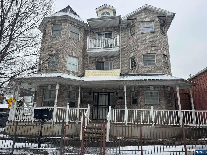 Exceptional investment opportunity in Newark! This newer-built, massive 3-family home at 787-789 Clinton Ave is a rare find, featuring a total of 12 bedrooms and 5 full bathrooms. Perfect for investors or owner-occupants, the property will be delivered entirely vacant at sale. Each expansive unit offers a thoughtful top-bottom layout with separate utilities (electric, gas, and heat) for maximum efficiency. Modern comforts include central air for both heating and cooling throughout. The exterior boasts great curb appeal with a welcoming front porch, two private balconies, and a paved yard. Parking is a premium feature here, offering a 2-car attached garage plus a large driveway accommodating 4+ additional vehicles. Ideally located near local shops, schools, parks, and major transportation for an easy commute. High-income potential in a growing market.