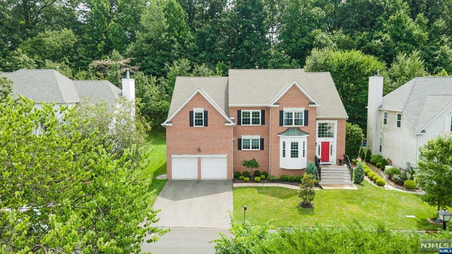 The Renovated Open-Concept Home You've Been Waiting For! Expansive & Gorgeous 5 Bedroom 3.5 Bath Brick Colonial Home with Finished Basement Nestled on a Quiet Dead End Street. Completely Turn-Key & Renovated Top to Bottom. Expansive & Open Concept Kitchen that Opens to a Massive Great Room. Kitchen Completely Gut-Renovated with Quartz Countertops & New Appliances. Great Room Features Soaring High Ceilings, Fireplace & is off Separate Dining Room. New Hardwood Oak Floors Line the Entire Home. Amazing In-Law Suite & Mother-Daughter Flexibility: Finished Basement Features Full Kitchen with Bar, Bedroom, & Full Bath with Sauna. Home Gym Downstairs. 4 Large Bedrooms Upstairs. Primary Bedroom Suite Sports Cathedral Ceilings & Walk in Closet. Primary Bath Completely Renovated with Stand Alone Tub & Shower. New Windows. Brand New Roof. New Mechanicals. 2 Car Garage The Perfect Turn-Key & Renovated Home to Get Into Just Before the Fall Season.