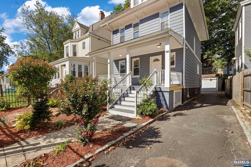 ***BACK ON MARKET W/ $15K PRICE IMPROVEMENT***Beautifully renovated colonial in a prime location! As you step onto the property you'll find a lovingly maintained garden with ample parking leading back to the detached 2 car garage and spacious yard! Stepping into the home you'll find updates at every turn - new flooring throughout the first level leads you into the main living room with upgraded chandelier, separate dining room and 1/2 bath, and fully renovated eat-in kitchen with granite counters, stainless steel appliances, and access to the back yard and garage. Moving upstairs you'll note two generously sized jack & jill bedrooms with a third cozier room perfect for a nursery or office. Finishing this level you have a spacious shared full bath. On the third level is an additional full bath and 2 spacious bedrooms. Features an unfinished basement with separate entrance and laundry. Steps from shopping & dining on Central Ave and NYC transit buses.Don't miss this opportunity!