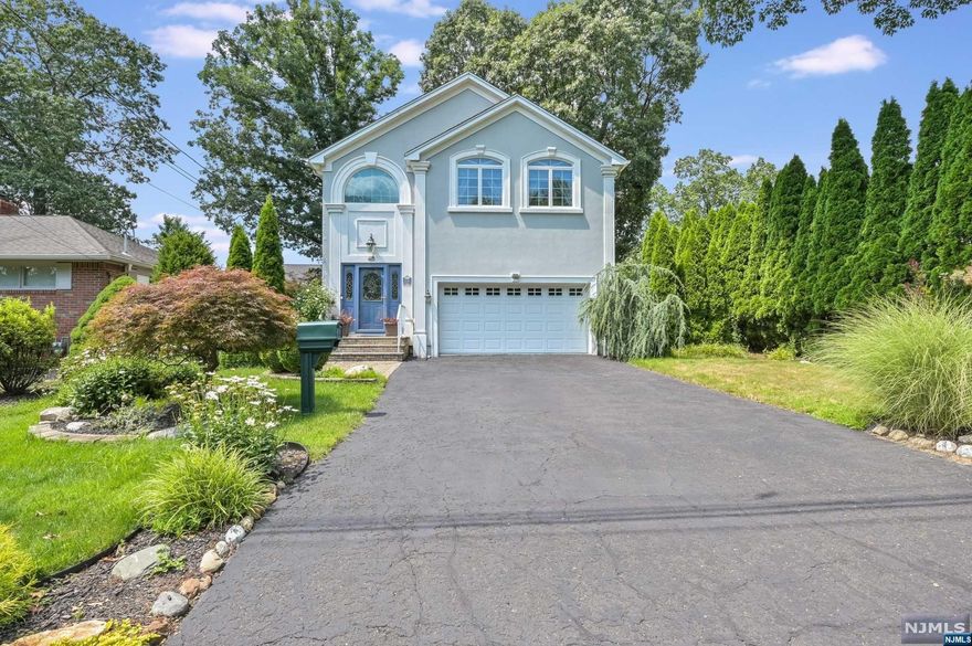 Pride of ownership! Large Col on quiet street yet short distance to town center & NYC train/bus for Hillsdale or Woodcliff. Custom built side hall Col W/open flr plan has been updated for today's lifestyle. Custom cherry wood granite kitchen with center peninsula for cafe style seating for 4 plus additional cabinetry. New Bosch D/W, stainless steel appliances & new overhead micro. Living room features gas FPLC and SGD to private decking & lush landscaping. 2nd floor features beautiful Bamboo flooring T/O. Primary suite with cathedral ceiling, new primary bath featuring custom Porcelanosa tile & Krion double sink. Vaulted guest bath with custom tile work and 3 additional LRG BR's complete the 2nd floor. For additional living space, the finished lower-level W/high ceiling offers custom tile flooring, family room plus office area and laundry/utility room. Other amenities include power awning over deck & New Wtr Htr. Nothing to do but unpack. Final & best by Wednesday the 9th 12pm.