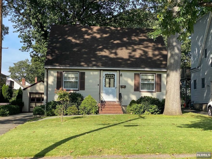 Surrounded by larger houses, this home was built for the original owner and it's the first time it's on the market. Located at the north end of town and very close to memorial Park (1 block away), schools, library, NYC bus and train. This home has been well kept and sits on property 150 feet deep offering expansion possibilities if wanted. Hardwood flooring on both levels. Update at your own pace. No cancelling outdoor events with a screened-in porch across the back of the house. With Van Saun County Park and Zoo close by as well as major shopping centers, there are always activities for friends sand family.