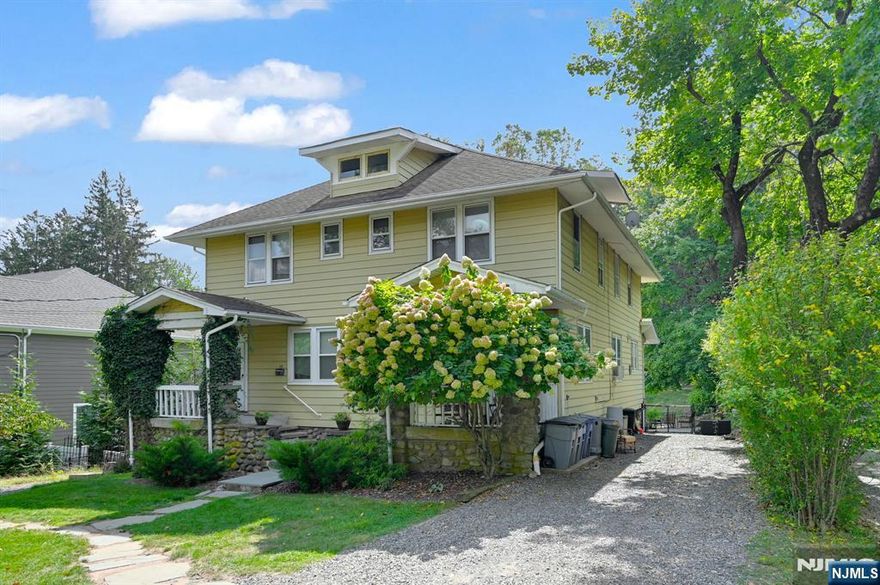 Great opportunity to purchase this rare side by side 2 family home on beautiful 346' deep private property. Perfect for owner occupied or investors. Unit 1: Large living room, formal dining room, updated center island kitchen open to family room with covered deck overlooking lush property, 1/2 bath and laundry. Upstairs is Primary bedroom, 2 more bedroom and a bath. Unit 2: Livingroom/dining room combo, updated kitchen with laundry. Upstairs Primary bedroom, 2 additional bedrooms, and bath. Conveniently located 2 blocks from grammar school, close to shopping and NY transportation.