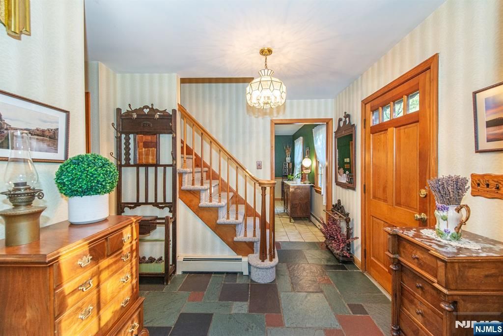 Photo of 300 Merrywood Drive, Wyckoff, NJ 07481 (MLS # 25036255)