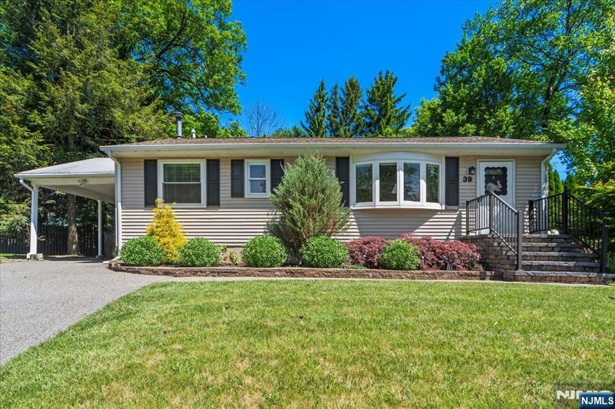 Welcome to this beautifully maintained ranch-style home offering a perfect blend of comfort, convenience, and classic charm. Featuring two bedrooms and two bathrooms, this home is thoughtfully designed with hardwood flooring and recessed lighting throughout, creating a warm and inviting atmosphere. The eat-in kitchen is a true highlight, complete with granite countertops, stainless steel appliances, built-in cabinetry, and a skylight that fills the space with natural light. A sliding door leads directly from the kitchen to a spacious deck, ideal for relaxing or entertaining. The primary bedroom is conveniently located on the first floor and includes a walk-in closet and an ensuite bathroom with a jetted tub and a separate stall shower, providing a peaceful retreat at the end of the day. The fully finished basement significantly expands the living space and offers incredible versatility. It features a carpeted rec room, a laundry area, and a dedicated office spaceâ€”perfect for work or play. There's also a large unfinished storage room, ideal for organization or future customization, as well as an additional room with hardwood flooring that can serve as a workout area, studio, or guest space. An attached carport provides covered parking, while the outdoor storage shed adds extra functionality. Decorative molding adds a touch of elegance throughout the home. Located in a desirable neighborhood near parks and popular restaurants, this move-in ready home is a must-see!