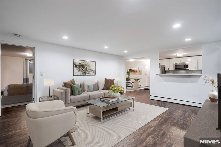 Discover this beautiful ground-level unit truly move-in ready! Flooded with natural light, this 2-bedroom, 1-bath residence has been thoughtfully renovated with new flooring, fresh paint, new doors, and updated hardware. Enjoy the peace of mind that comes with low-maintenance living, which includes Cold Water/Hot Water/Gas, Pool, storage, and on-site laundry. There is also a 24 hr Superintendent on premises. Nestled in Fort Lee's most coveted neighborhood and just moments away from NYC, this home offers a tranquil, picturesque setting with convenient access to shopping, dining, and major commuter routes. If you're seeking a ground-level unit for effortless accessibility, this sun-filled gem is the perfect choice. Don't miss out this fantastic opportunity to own or invest will not last!