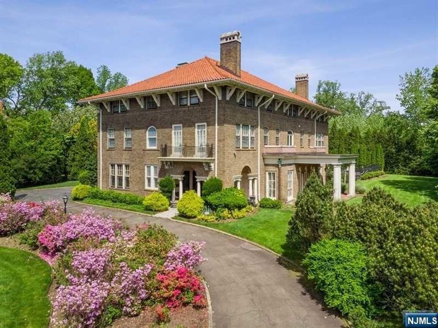 Stunning 1912 Upper Montclair Italian Renaissance Estate with unbeatable location. Walking distant to both Upper Montclair and Watchung Plaza trains, shops and popular eateries. New York City bus is just out the front door! The home boasts extraordinary original architectural details including grand scaled rooms, high ceilings, 5 fireplaces, beamed ceilings, rich wood details and custom millwork. The home rests on over 2 acres of professionally landscaped property offering heated gunite pool with spa, Cabana, 3-car attached garage and plenty of grassy lawn space to play. An adjacent 2 unit Carriage house with separate driveway generates great rental income.