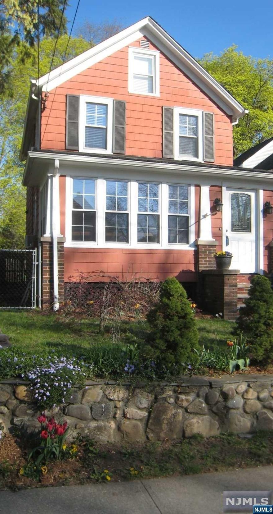 Charming country colonial in the heart of Midland Park. Updated w/warm and inviting paint colors. Amazing spacious eat-in kitchen w/granite counter tops, tile backsplash, newer cabinets & stainless steel appliances. Bright vestibule leads you into the open floor plan. Office/sunroom w/cathedral ceiling, living room & dining area. A powder room and back door out to the fully fenced in yard complete the 1st floor. Up to the 2nd floor.. Fabulous Primary bedroom w/exposed original brick chimney, container store closet built-ins & recessed lighting w/dimmers. The 2nd bedroom also has container store built-ins & recessed lighting w/dimmers. Full bath, linen closet & attic access round out the top floor. Back down to the lower level..for laundry & a hang out rec room. The deep property is fenced in and is great for entertaining and pets.Hardwood floors through-out.Close to town and all Midland Park has to offer.An Ideal home not to be missed. Also for rent NJMLS. No showings until 4/1.