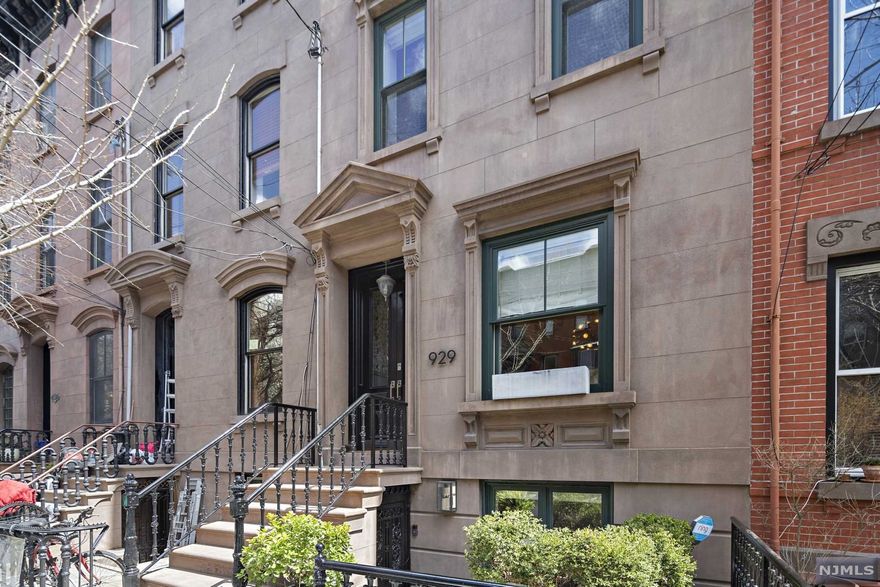 929 Bloomfield Street stands prominently on one of Hoboken's most coveted uptown tree-lined streets. Rarely available, this four-story, five-bedroom, three and one half bathroom brownstone townhouse has the ideal layout, and the home has been meticulously renovated with ultimate craftsmanship and design while keeping emphasis on functionality. Inspired by the collaborative efforts of Mowery Marsh Architects, JLaurie Designs and the homeowner, the extensive renovations included but were not limited to rebuilding the three story bay window and completely gutting the garden level which included waterproofing, insulation under the new slab and all new plumbing including new and reconfigured sewer and water lines. The open plan parlor floor epitomizes the seamless integration of modern design juxtaposed with the brownstone's turn of the century details. Easy access to boutique shopping, restaurants, cafes and Hoboken's 14th St NY Waterway Ferry and NJ Transit for access to NYC.