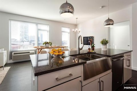 Photo of 159 Cedar St #402, Fort Lee, NJ 07024 (MLS # 26001257)