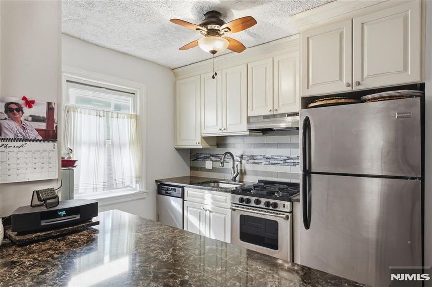 Come see the most desirable unit in the Tall Trees Condominium Complex. This well-maintained 1-bedroom, 1-bath condo offers privacy, comfort, and commuter convenience with a rare private entry and assigned parking space directly outside the door. Located just steps from NJ Transit bus service for easy access to NYC and surrounding areas. Enjoy a grassy outdoor area nearby for relaxing outdoors. Inside features an open floor plan with hardwood floors and abundant natural light. The custom kitchen with breakfast-bar counter flows into the living area, ideal for everyday living or entertaining. Spacious bedroom and well-maintained bath. Excellent storage including interior closets plus approximately 300 sq ft of basement space with private washer and dryer. Low HOA fee and no known assessments. No Rental Restrictions! Donâ€™t miss this rare opportunity, schedule your private tour today!