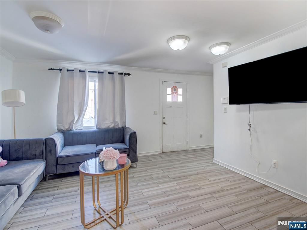 Photo of 118 Carlisle Avenue, Paterson, NJ 07501 (MLS # 26006728)