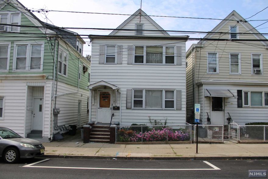 Great Opportunity! Come and take a look at this move-in-ready two-family home located in Botany Village Clifton. The 1st floor has 2 bedrooms and 2nd 3 beds along with eat-in -kitchen, a living room, and a full bathroom on both floors. The 2nd unit has access to a walk-up attic, with 1 additional room and storage. The full basement offers a ton of possibilities! Outside, you have a fenced-in backyard and ample space for entertaining. Utilities are separate, other than water. Perfect for first-time homebuyers and/or investors! Close to all major highways: Rt.20, 21, 46, 80, Garden State Parkway. Sold As Is!!!