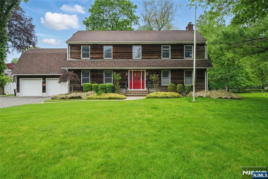 Step into a dramatic two-story foyer that sets the tone for this spacious and versatile 5-bedroom home, conveniently located in sought-after Demarest. The open-concept first floor offers a fantastic layout with multiple options for a guest suite, primary bedroom, or additional great room. Upstairs, you'll find a roomy second floor with plenty of space to spread out. Enjoy the convenience of full laundry rooms on both levels, and relax or entertain on the brand-new deck. This home is the perfect blend of comfort, flexibility, and modern living.