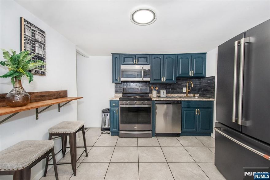 Welcome home to this beautifully renovated in 2024 1281 Square Foot home in the very desirable RONBOUND section of Newark. Home features 2 bedrooms 1 bath, kitchen with breakfast bar, washer, dryer in laundry room, unfinished basement area and large back yard for plenty of entertaining. Home located near Path trains to NYC, shopping, restraunts, nightlife and all major highways and transportation. Live in this gorgeous home or AIR BNB for passive income!